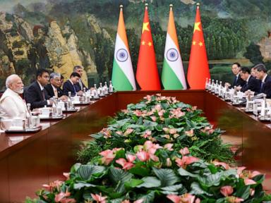 Xi meets Modi as China and India seek to rebuild ties