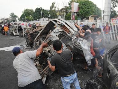 3 dead after mob sets fire to Indonesian regional parliament building