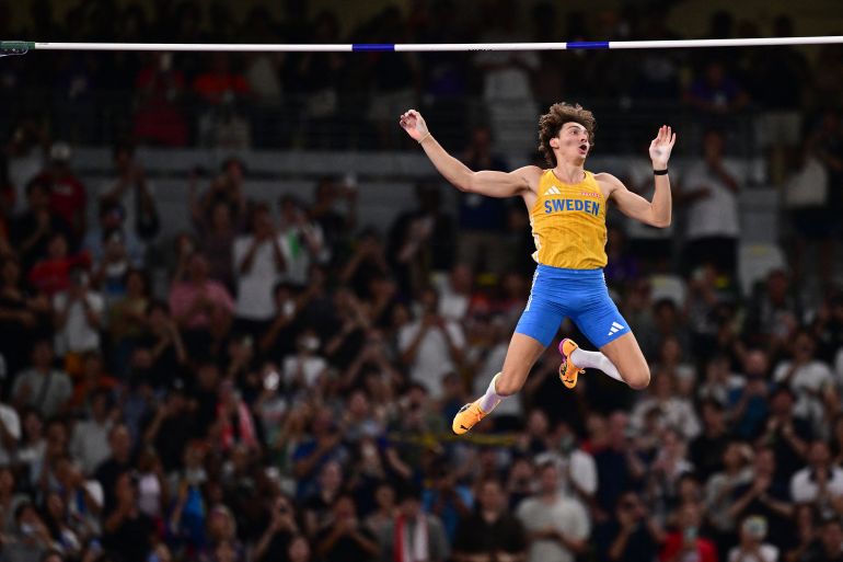 Duplantis breaks pole vault world record to win gold in Tokyo