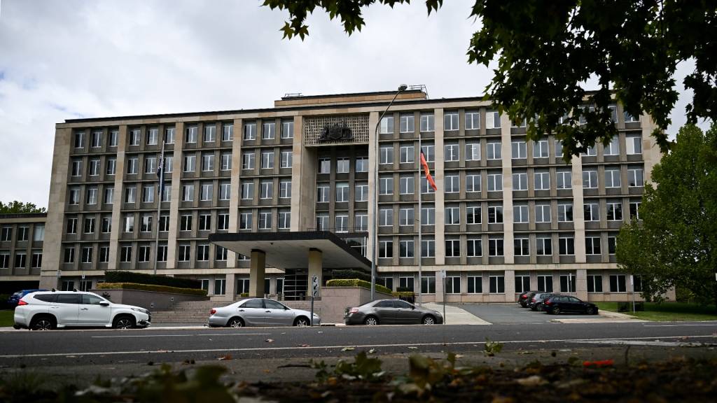 Tax fraud conviction of ATO insider; bailed to appeal jail sentence