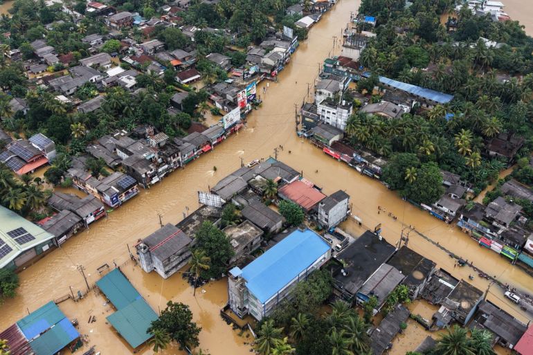 ‘Neighbourhoods buried under mud’: Sri Lanka floods death toll rises to 159