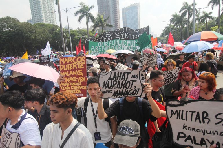 Thousands march in Philippines, demanding Marcos resign over fraud scandal