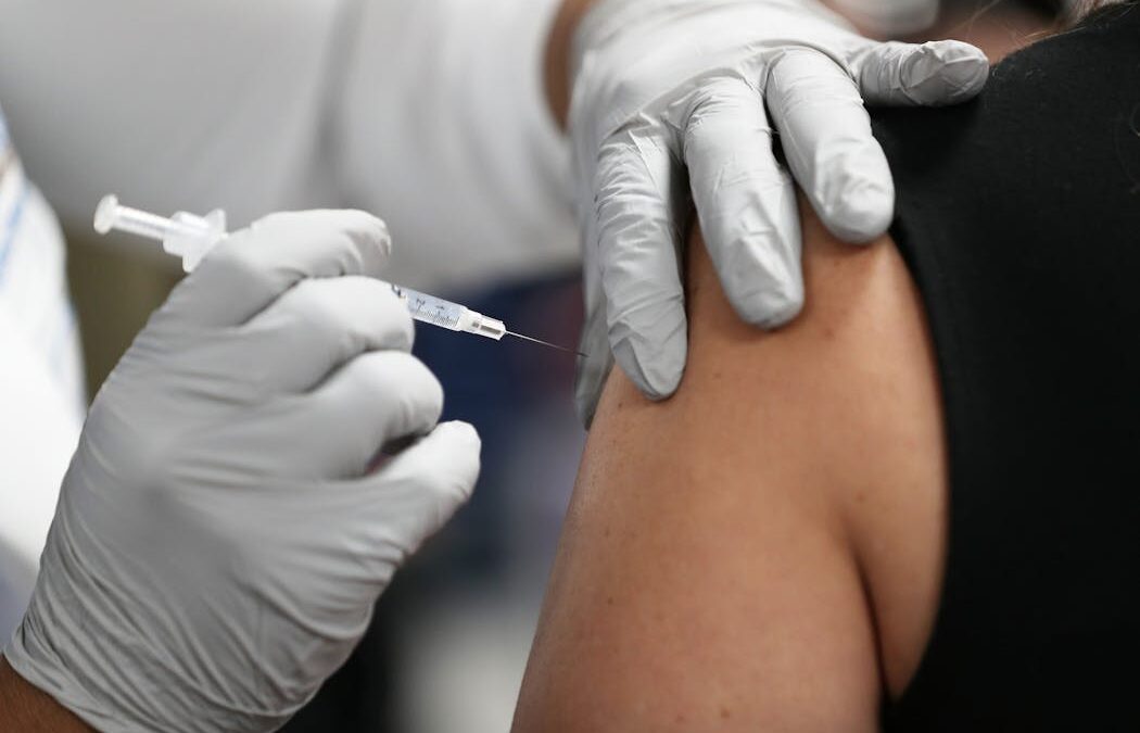 Your risk of catching COVID is at its lowest since 2020 – but here’s why you should still get boosted for Christmas