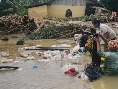 Sumatra residents loot for food and water after deadly floods