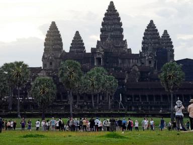 A night bus from Cambodia’s top tourist destination plunges off a bridge, killing 13 passengers