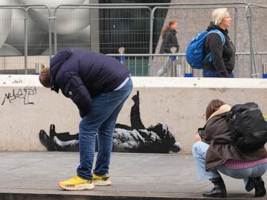 Banksy unveils new art in London following speculation over murals