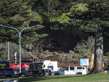 A search for 6 presumed dead in a New Zealand landslide is expected to take days