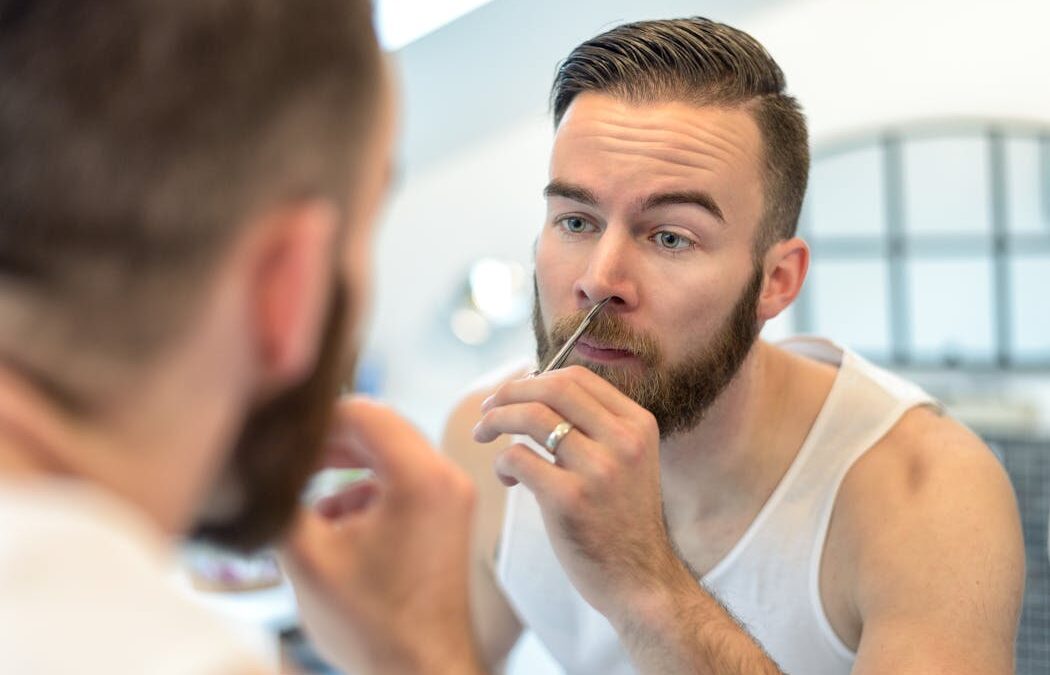 Why do nose and ear hairs become longer and thicker as we age?