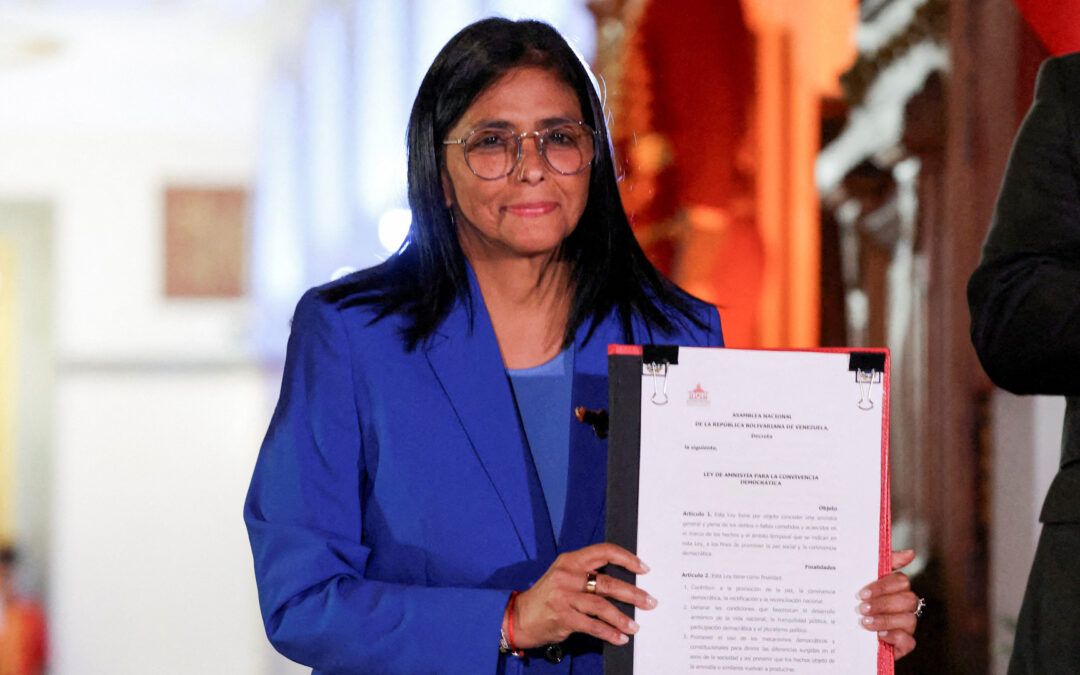 Venezuela signs amnesty law as families await prison releases