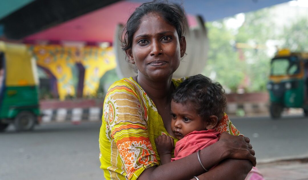 ‘I count their breaths’: A homeless mother protects her children in Delhi