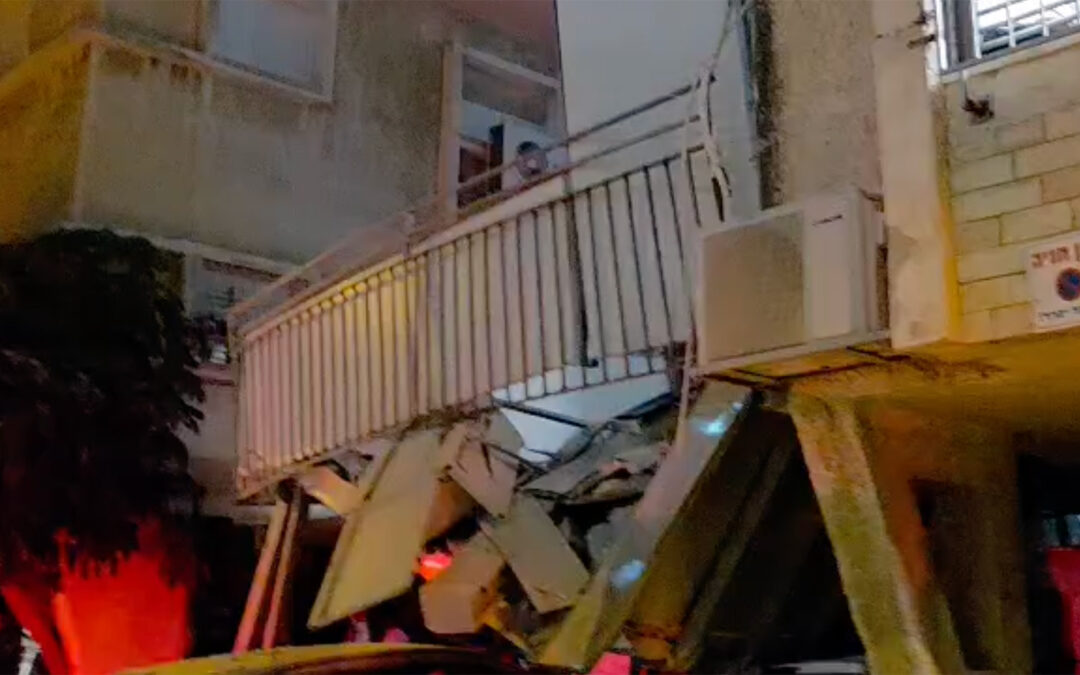 Building collapses after Iranian missile strike on Israel