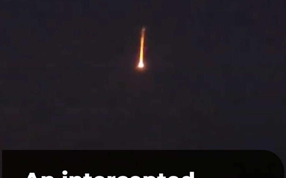 An intercepted drone burns and falls over Erbil in Iraq