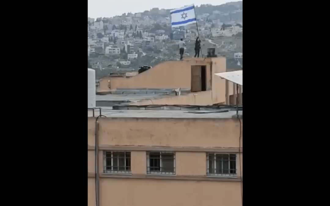 Israeli settlers vandalise school, raise Israeli flag in occupied West Bank