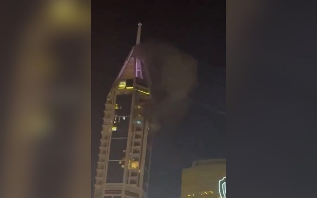 Smoke rises from a Dubai tower after attack