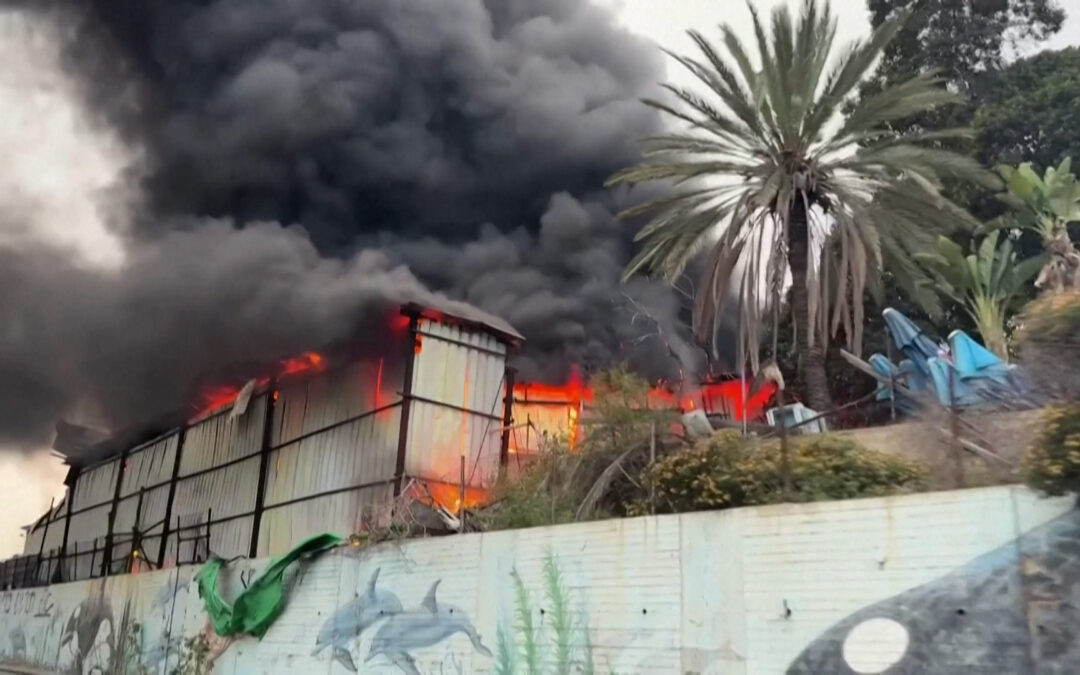 Iranian missile strike in central Israel sets building ablaze