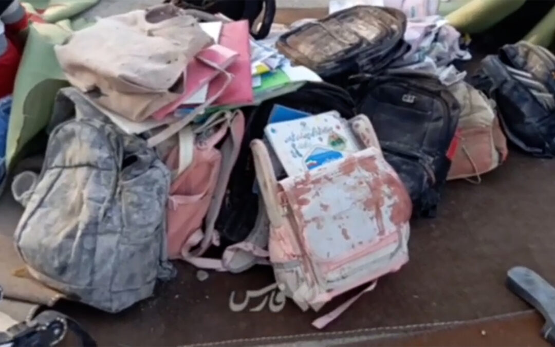 Backpacks, schoolbooks seen amid rubble of Iranian girls’ school