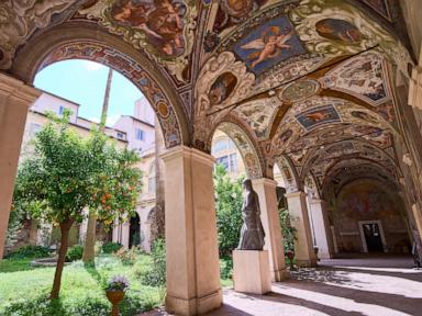 A hidden cloister in the center of Rome has a turbulent past etched on its walls