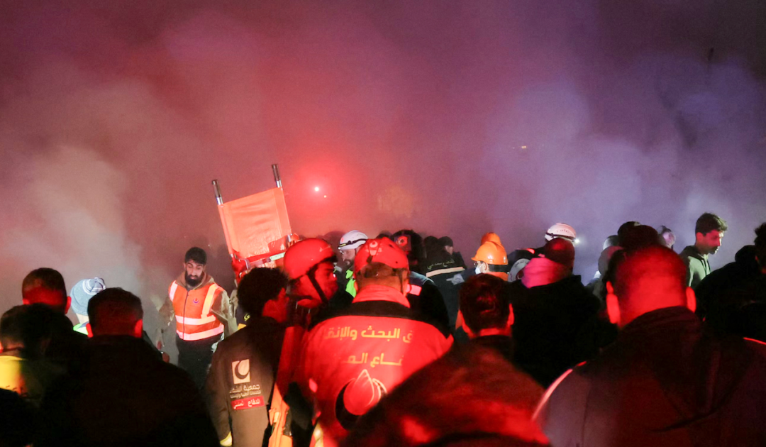 Emergency workers search for victims of Israeli airstrikes on Beirut