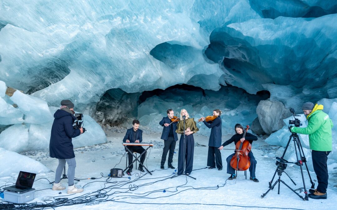 Musician performs inside melting glacier to highlight climate crisis