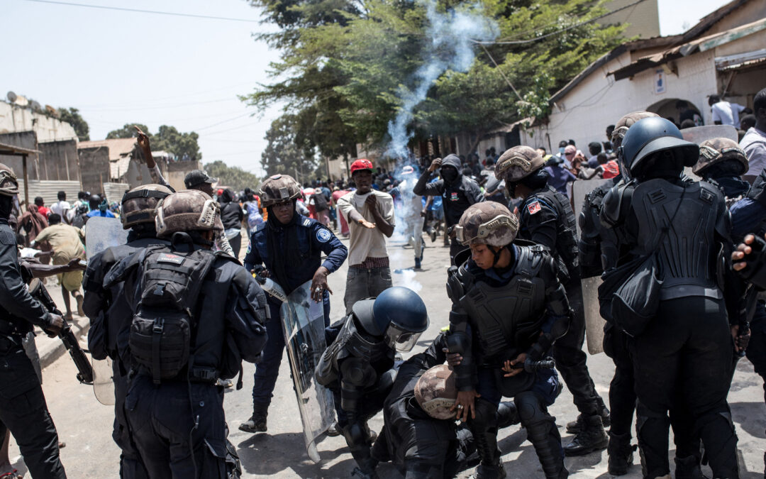Gambia police fire tear gas at rally over rearrest of siblings