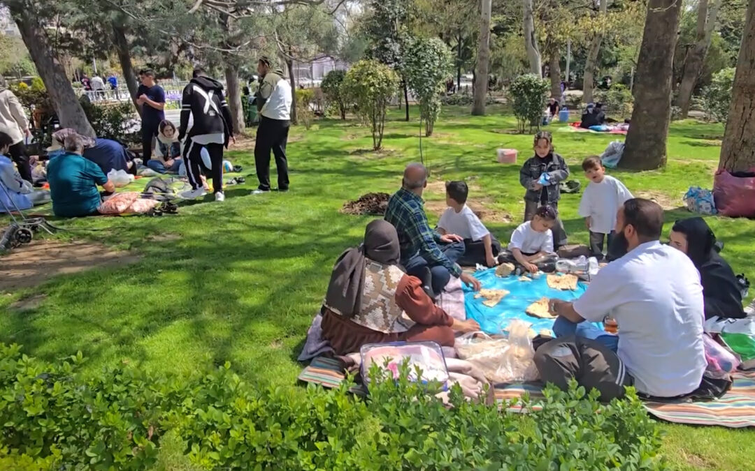 Iranians celebrate New Year in parks despite ongoing attacks