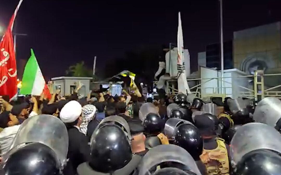 Protesters in Iraq swarm Kuwaiti consulate after deadly rocket attack