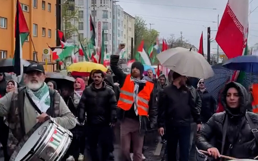 Protesters defy Berlin rain to call for end to global wars
