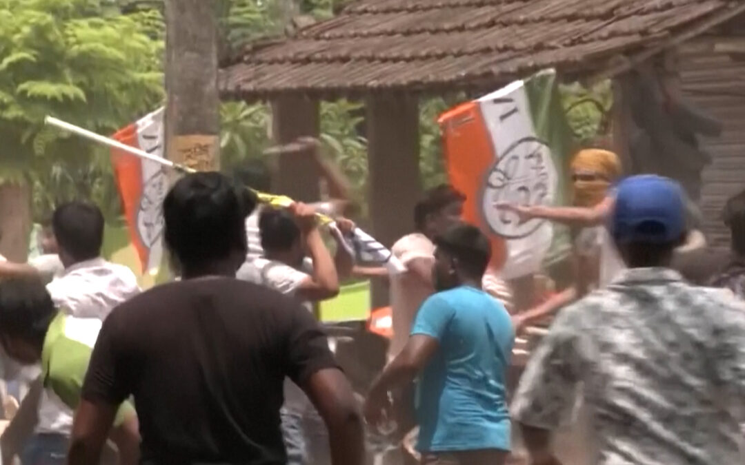 Rival party workers fight on election day in India’s West Bengal