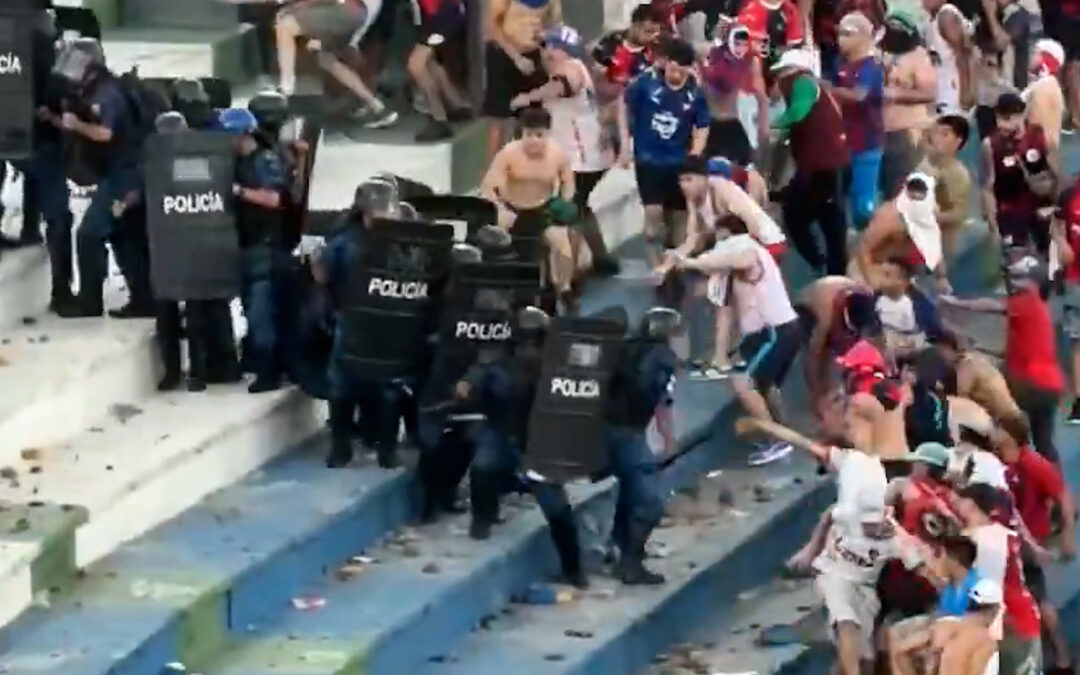 Fans fight police at Paraguay football match