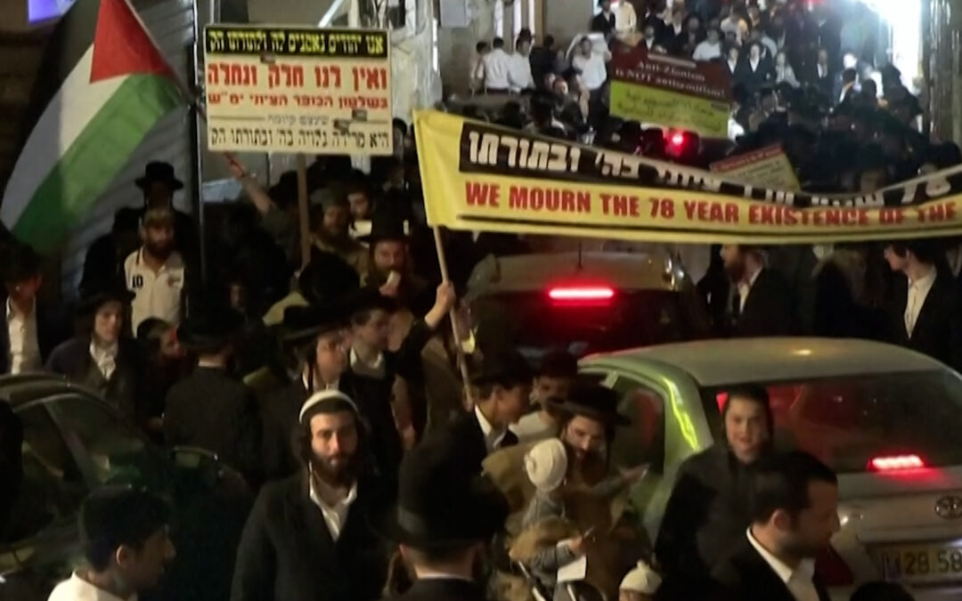 Ultra-Orthodox Jews burn Israeli flags to protest national day