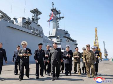 North Korean leader supervises missile tests from his naval destroyer