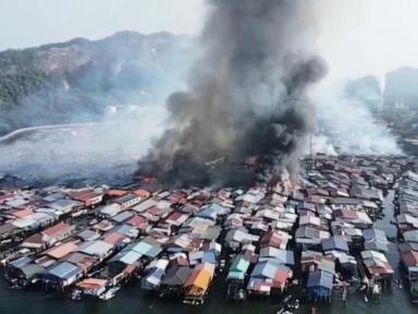Fire destroys 1,000 homes in a Malaysian coastal village on Borneo Island
