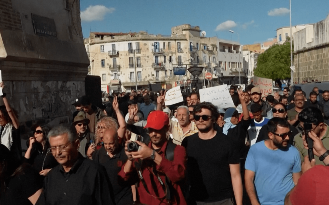 Tunisians rally amid economic crisis and political arrests