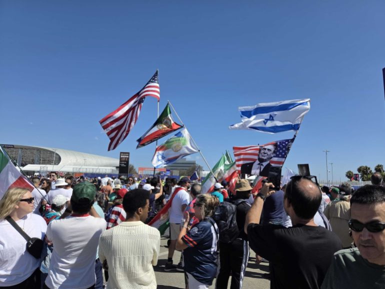 Football upstages politics as Iranians rally behind their team at World Cup