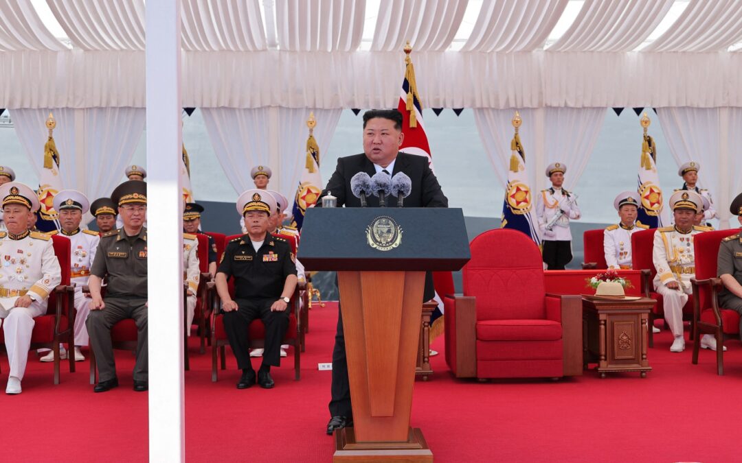 North Korea commissions warship as Kim eyes nuclear navy