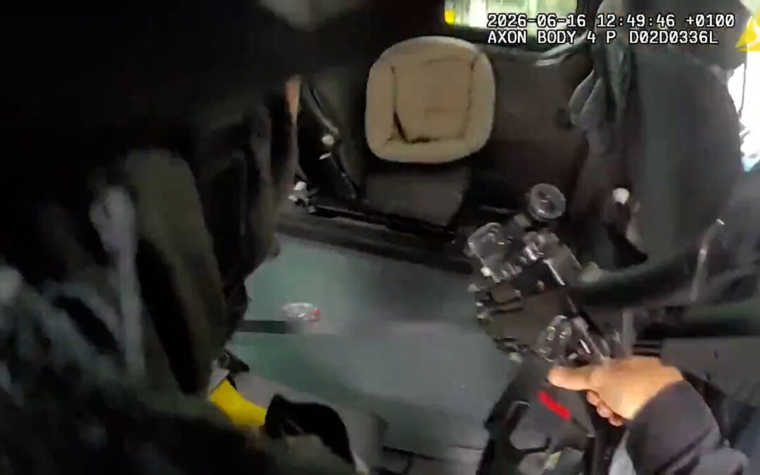 Bodycam shows driver offering armed police a lift mid-chase