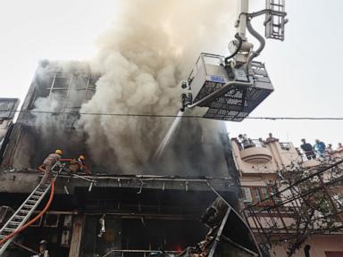 Fire tears through building in northern India, killing 14, mostly students