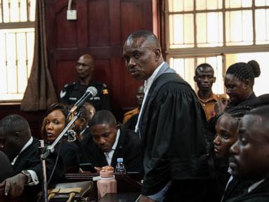 Uganda court charges lawyer for jailed Ugandan opposition leader with concealing treason
