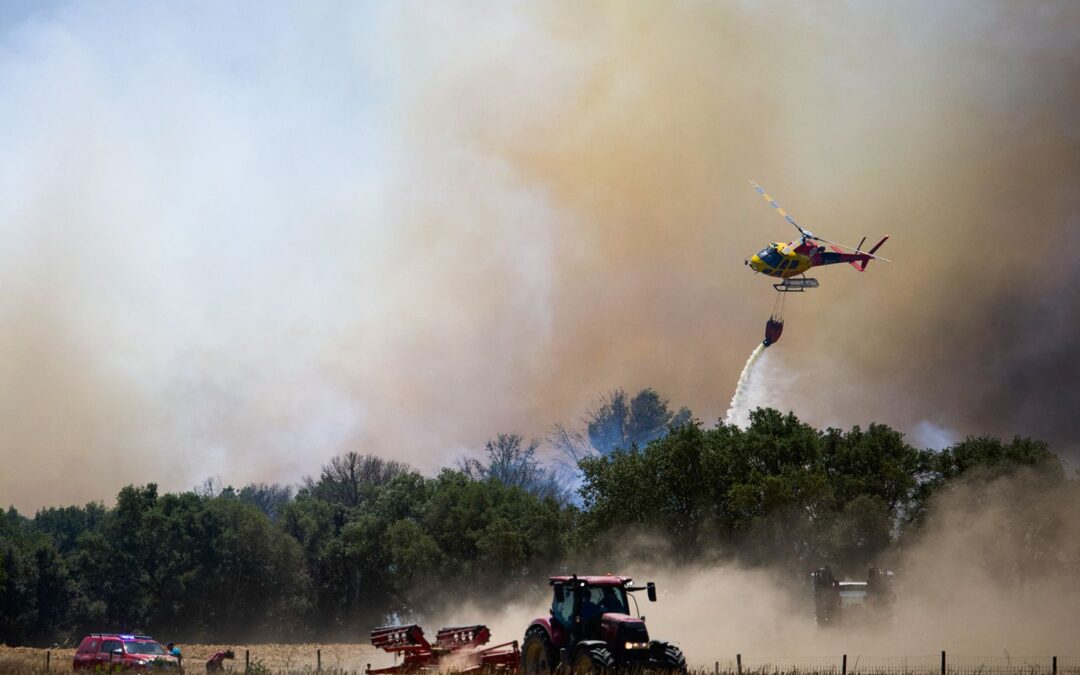 Firefighters race to contain flames in northeastern Spain