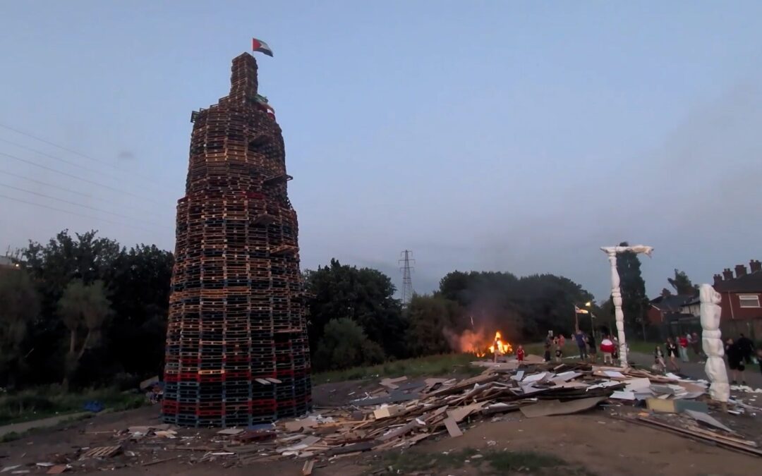 Anti-migrant display set alight in Northern Ireland bonfire