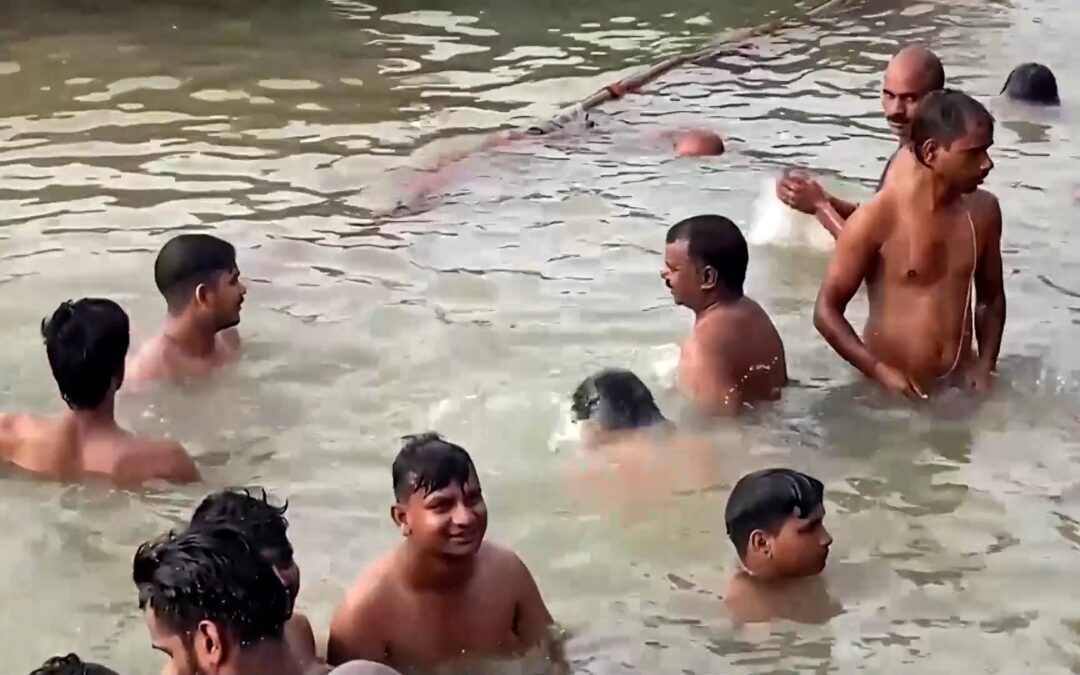 Hindus take holy dip in India’s rivers on sacred holiday