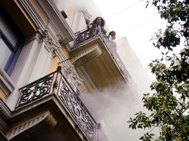 Greek police arrest 2 people over 2010 fatal arson attack on Athens bank