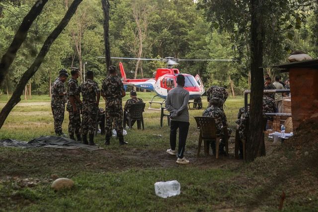Nepali families pray for miracles with relatives missing after flood