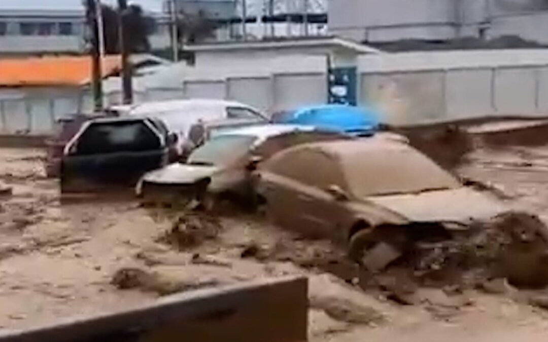 Cars swept downhill as flash floods hit northern Chile