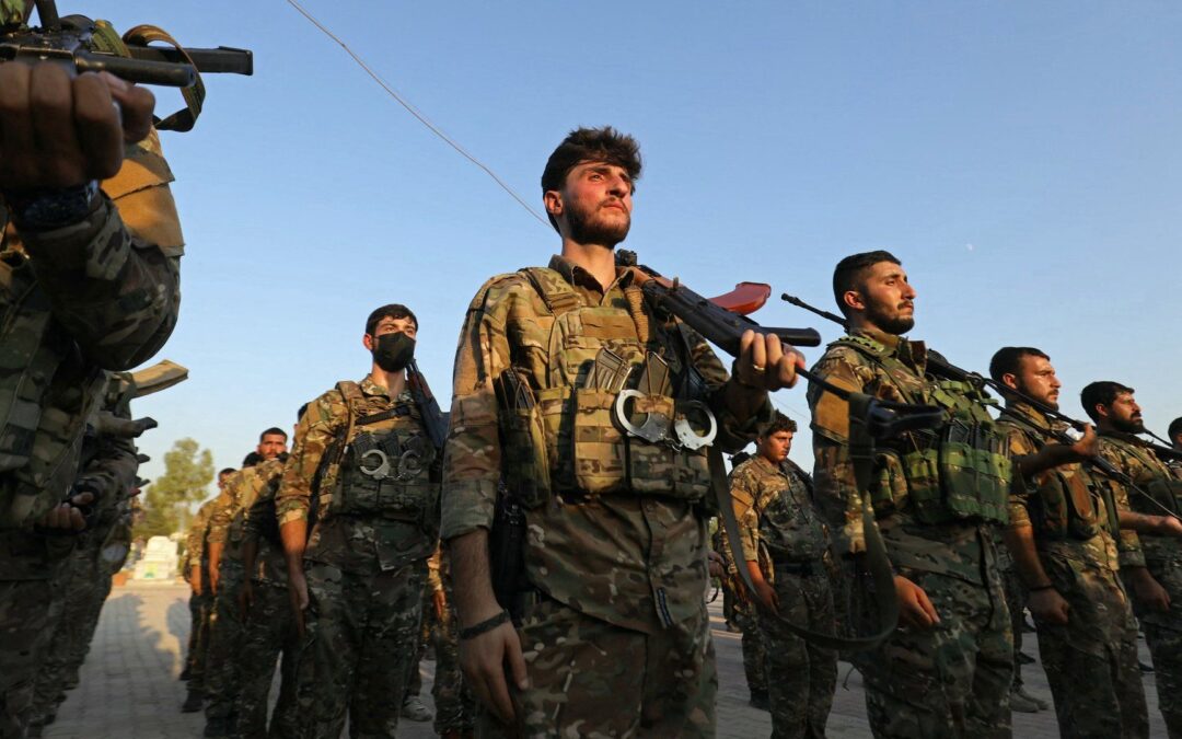 Who were the Syrian Democratic Forces and why dissolve?