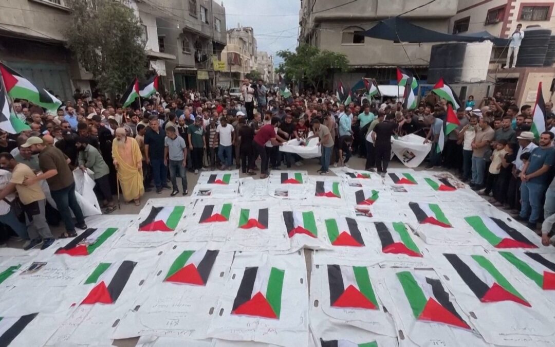 Mourners in Gaza bury remains of loved ones killed in 2023 Israeli strike