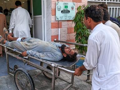 Gunmen target ambulance in Pakistan after suicide bombing at checkpoint killed 12