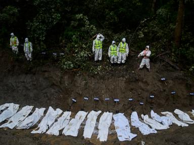 Mass burials in Nepal as death toll from flash floods exceeds 1,000