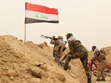 As the last US troops pack up in Iraq, militias signal their weapons will stay