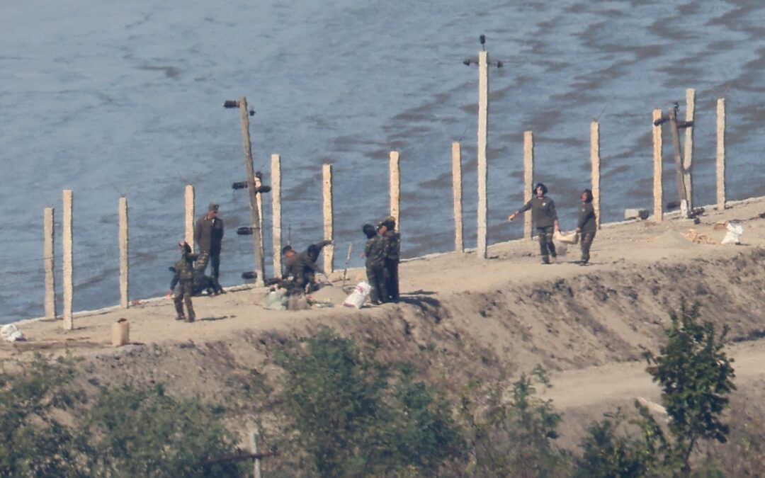 North Korea fires missiles as row over landmine blast intensifies